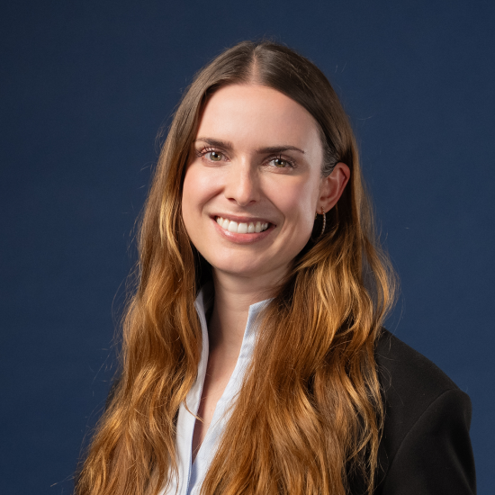Portrait of Ann-Kristin Wagner against a dark blue background